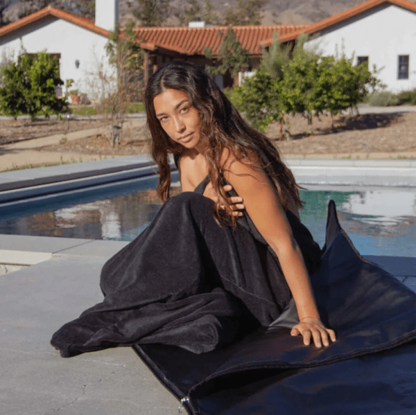 HigherDose Sauna Blanket and Insert Bundle Woman in Pool